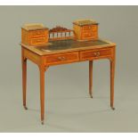 An Edwardian inlaid mahogany writing table,