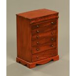 A 19th century mahogany miniature chest of drawers,