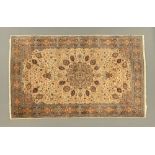 A Persian design woollen rug,
