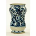 A 19th century Italian blue and white Albarello, blue and white foliate. Height 16 cm.