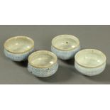 William Plumptre, four sake bowls, blue flecked glaze initialled to base each diameter 7 cm.