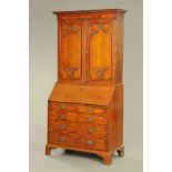 A George III oak and mahogany crossbanded bureau bookcase,