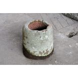 A cylindrical sandstone vessel, with hole right through. Height 38 cm, diameter +/- 35 cm.