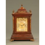 An Edwardian Elliott mahogany cased triple fusee bracket clock,