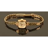 A 9 ct gold Excalibur ladies wristwatch, with 9 ct gold bracelet, gross weight 14.2 grams.