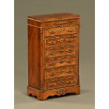 A late 19th/early 20th century continental miniature chest of six drawers with gilt brass mounts,