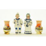 A pair of 19th century blue and white nodding head figures,