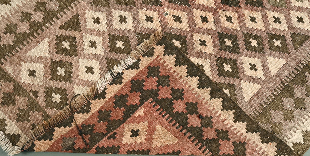 A Kelim rug, 102 cm x 60 cm. - Image 2 of 2