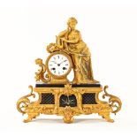 A 19th century French figural mantle clock,
