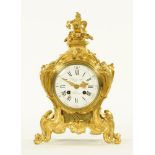 A 19th century French gilt bronze mantle clock, with movement by Raingo Freres Paris,