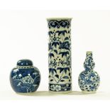 A Chinese cylindrical vase, a lidded ginger jar and gourd shaped vase. Tallest 25 cm.