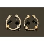 A pair of 18 ct white and yellow gold earrings,