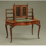 A Victorian mahogany writing table, with superstructure and green leather writing surface,