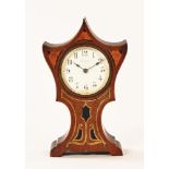 An Art Nouveau brass strung and inlaid mantle clock, the face marked Elkington & Co Cheapside,
