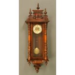 A late 19th century Vienna style regulator wall clock,