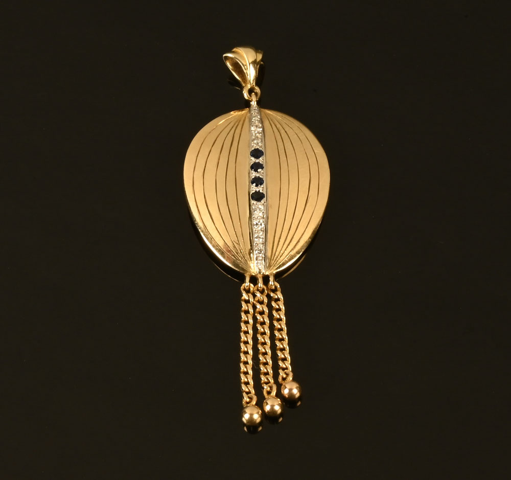A 9 ct gold sapphire and diamond tassel pendant.