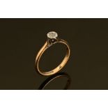 A 9ct gold platinum and diamond chip illusion set ring, Size M/N.