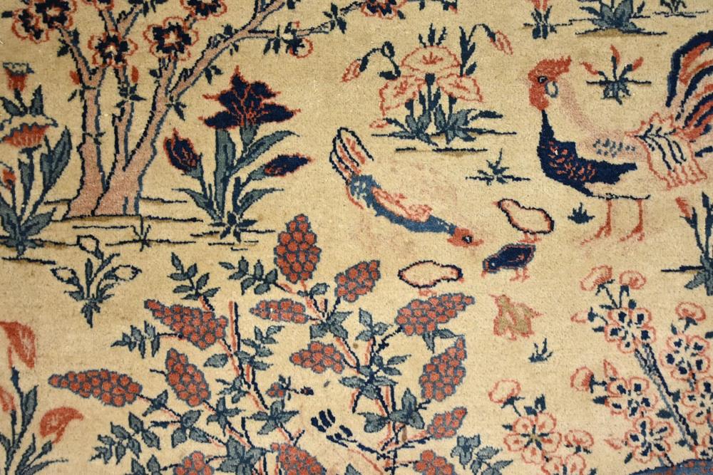 A pair of Eastern silky pile fringed rugs, decorated with various birds, - Image 21 of 23