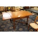 Oak extending dining table on barley twist legs, fully extended length 185 cm,