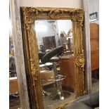 Gilt effect carved framed mirror, height 147 cm,