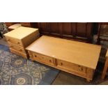 Pine low chest of drawers together with a pine drawer coffee table