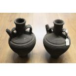 Pair of Etruscan style earthenware ewers,