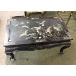 Oriental style black lacquered folding leg coffee table decorated with decorative cranes