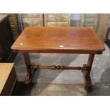 Mahogany table with turned stretcher and on raised feet, height 75 cm, width 90 cm,