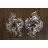 Two candle wall mounted sconces in white metal,