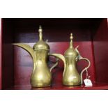 Two North African brass dallahs,