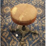 Upholstered stool on cast iron hairy paw feet