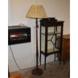 20th century oak standard lamp with cream shade and turned column