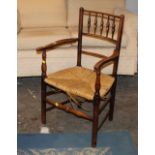 Elm spindle backed carver armchair with rush seat