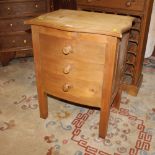 Modern pine serpentine fronted three drawer bedside chest, 70 cm tall, 54 cm wide,