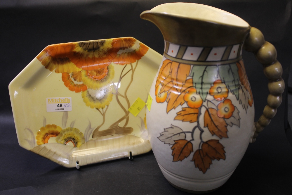 Clarice Cliff Bizarre pattern plate and Charlotte Reed designed Ducal jug,