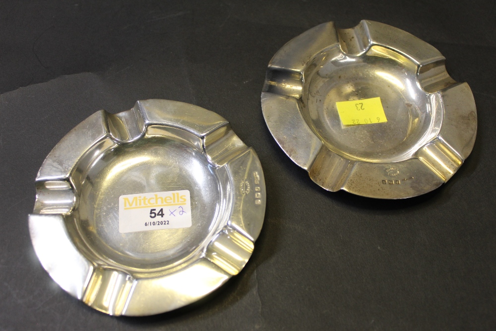 Pair of Birmingham silver ashtrays stamped Asprey's of London