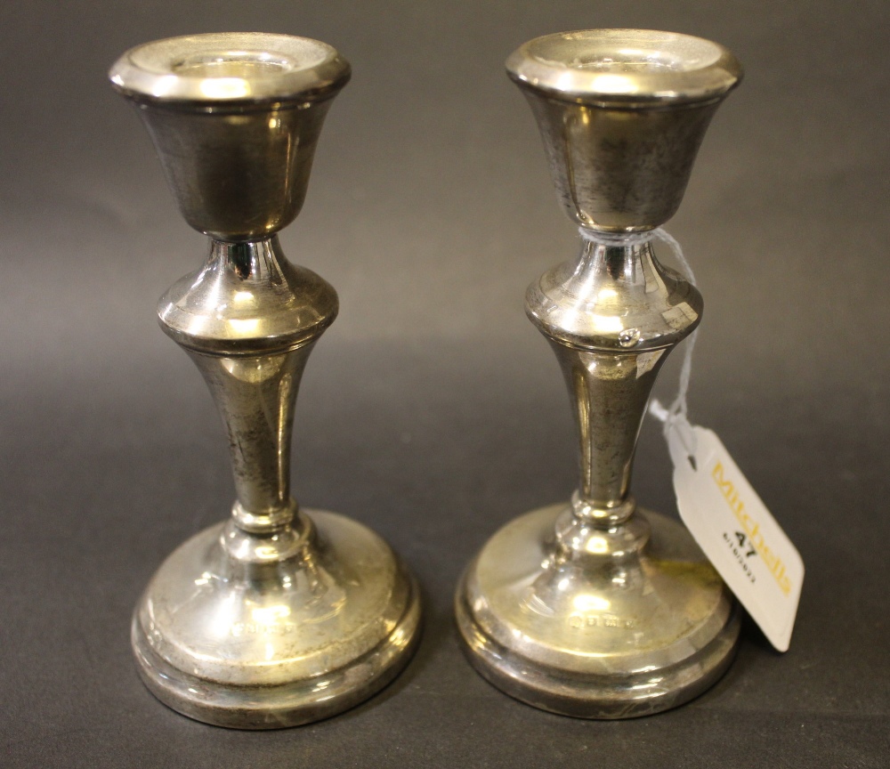 Pair of Birmingham silver candlesticks, height 11.