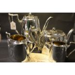 Four piece silver plated tea set with no inscription but a certificate for Barrow Athletic