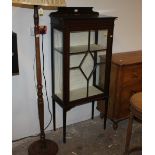 Edwardian mahogany inlaid china display cabinet with raised back and on square tapering legs,