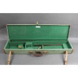 Brady a canvas and leather trimmed shotgun motor case with space for 30" barrels,
