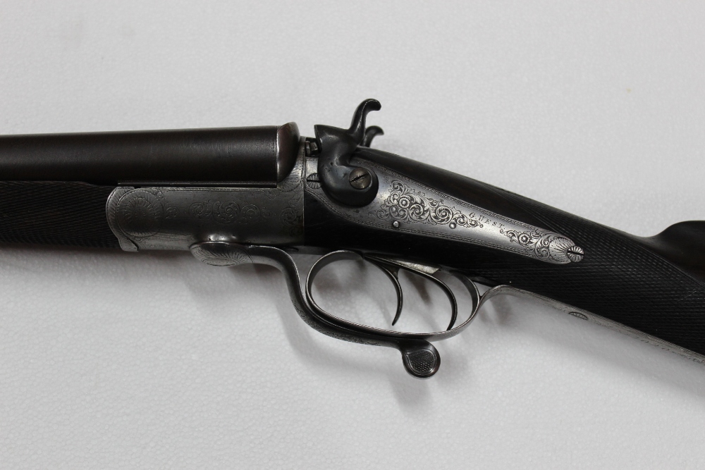 G West Retford, a 12 bore side by side hammer shotgun, with 30" Damascus barrels,