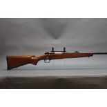 Winchester model 70 SA cal 243 bolt action rifle, fitted with a screw cut 21" barrel and 1" mounts,