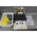 Five large plastic trays, containing a large quantity of trout and salmon flies,