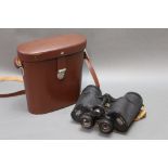 A pair of Carl Zeiss Jena Genoptem 10 x 50W binoculars, with leather case.
