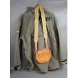 A Game Smock with hood, Size XL, together with a muzzle loaders leather bag.