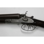 Henry Aitken (From Purdey's) a 12 bore side by side hammer shotgun, with 29 3/4" Damascus barrels,