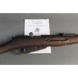 Mosin Negant a deactivated bolt action military rifle.