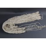 Twelve rabbit purse nets.