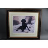 John Trickett, a signed limited edition print of a Black Labrador in the snow,