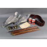 A box containing three rubber pigeon decoys, Parker Hale Express gun oil, cartridge belt,